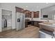 Well-equipped kitchen with stainless steel appliances, including a refrigerator and range at 244 Lasswade Ct, Zebulon, NC 27597
