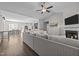 Spacious living room with hardwood floors, vaulted ceiling and cozy fireplace at 244 Lasswade Ct, Zebulon, NC 27597
