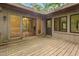 View of the back deck featuring a door to enter the home at 252 Fox Ridge, Pittsboro, NC 27312