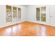 Corner bedroom featuring neutral paint and large windows overlooking the trees at 252 Fox Ridge, Pittsboro, NC 27312