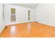 Bright room with parquet floors, neutral walls and windows with natural light at 252 Fox Ridge, Pittsboro, NC 27312