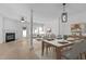 Bright dining area featuring a modern table set, stylish decor, and an open-concept layout at 2621 Asher View Ct, Raleigh, NC 27606