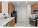 Well-equipped kitchen with modern appliances, sleek countertops, and ample cabinet space at 2621 Asher View Ct, Raleigh, NC 27606