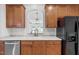 Kitchen with stainless steel appliances, a sink under the window, and ample cabinet space at 2621 Asher View Ct, Raleigh, NC 27606