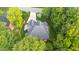 An overhead view of home and surrounding landscape, noting the roof architecture and backyard space at 3024 Weston Ct, Burlington, NC 27215