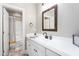 Bathroom with white vanity, black hardware, and neutral paint at 3024 Weston Ct, Burlington, NC 27215