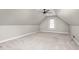 Carpeted bedroom with a dormer window and neutral paint at 3024 Weston Ct, Burlington, NC 27215