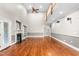 Spacious living room featuring a fireplace, high ceilings, and abundant natural light at 3024 Weston Ct, Burlington, NC 27215