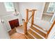 Grand staircase leading to the home's entrance, adorned with a chandelier at 3024 Weston Ct, Burlington, NC 27215