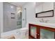 Bathroom features a glass-enclosed shower, hexagon tile floor, and a modern vanity at 306 Roebling Ln, Cary, NC 27513