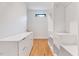 Walk-in closet with custom built-in shelving and drawers at 306 Roebling Ln, Cary, NC 27513