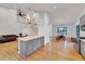 Open-concept living space with hardwood floors and high ceilings at 306 Roebling Ln, Cary, NC 27513