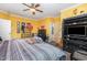 Comfortable bedroom with a ceiling fan, black furnishings, and carpet, creates a personal retreat at 3304 Black Stallion Ct, Zebulon, NC 27597