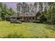 Charming brick home with manicured landscaping, offering a welcoming curb appeal at 3304 Black Stallion Ct, Zebulon, NC 27597