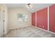 Carpeted bedroom with a large window and ceiling fan at 3519 Sugar Tree Pl, Durham, NC 27713