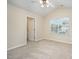 Spacious carpeted bedroom featuring neutral walls and natural lighting at 3519 Sugar Tree Pl, Durham, NC 27713