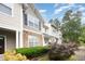 Townhome featuring manicured landscaping and inviting facade at 3519 Sugar Tree Pl, Durham, NC 27713