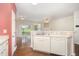 Kitchen bar overlooking a living area, perfect for gatherings and entertaining at 3519 Sugar Tree Pl, Durham, NC 27713