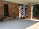 Attached carport area with brick pillars and exterior home details at 3604 Woodlawn Rd, Rocky Mount, NC 27804