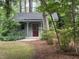 Exterior of a detached building with siding and mature trees at 3604 Woodlawn Rd, Rocky Mount, NC 27804