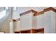 Close-up of the top of custom built-in shelving with wooden accents and high ceilings at 3605 Laurel Creek Way, Durham, NC 27712