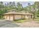 An appealing exterior view of the home showcasing a brick and siding design at 3605 Laurel Creek Way, Durham, NC 27712