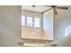 Bright great room featuring soaring ceilings, modern lighting, and large windows allowing natural light to illuminate the space at 3605 Laurel Creek Way, Durham, NC 27712