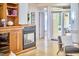 Cozy fireplace and built-in shelving in the living room, leading to an outdoor patio at 3605 Laurel Creek Way, Durham, NC 27712