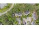 An aerial view shows the community's layout, showcasing its proximity to green spaces and convenient road access at 384 Lyndfield Cl W, Pittsboro, NC 27312
