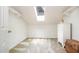 Bright closet featuring a skylight, shelving, neutral carpet, and white trim at 384 Lyndfield Cl W, Pittsboro, NC 27312