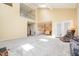 Bright, open-concept space with a dining area, living room, and high ceilings, perfect for entertaining and relaxation at 384 Lyndfield Cl W, Pittsboro, NC 27312