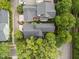 Aerial view of the property showcasing the well-maintained yard and surrounding neighborhood at 4001 Falls River Ave, Raleigh, NC 27614