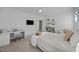 This bedroom features a dedicated desk space and a soft, neutral color palette at 4001 Falls River Ave, Raleigh, NC 27614