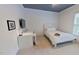 Clean bedroom featuring a twin bed, desk, and carpet floors at 4001 Falls River Ave, Raleigh, NC 27614
