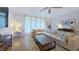 Bright living room featuring a large sectional couch and natural light at 4001 Falls River Ave, Raleigh, NC 27614