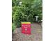 Neuse River Trail sign amidst lush greenery, inviting outdoor enthusiasts to explore nature at 4001 Falls River Ave, Raleigh, NC 27614