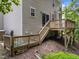 Wooden back deck with stairs, railing and lots of space at 412 Hay River St, Garner, NC 27529