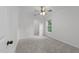 Bedroom featuring neutral carpet, a ceiling fan, and a window at 412 Hay River St, Garner, NC 27529