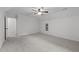 Bonus room featuring a ceiling fan and built-in shelving at 412 Hay River St, Garner, NC 27529
