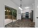 Modern kitchen with stainless steel appliances and sliding door access to the back deck at 412 Hay River St, Garner, NC 27529