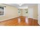 Bright bedroom features hardwood floors, large windows, and a neutral color palette at 417 N Gurney St, Burlington, NC 27215