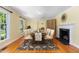 Formal dining room with hardwood floors, traditional decor, and natural light at 417 N Gurney St, Burlington, NC 27215
