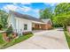 View of the home's side with driveway and carport, showcasing the well-maintained property at 417 N Gurney St, Burlington, NC 27215