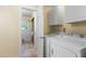 Laundry room adjacent to the bathroom with a washer and dryer at 417 N Gurney St, Burlington, NC 27215