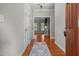 A bright entryway with hardwood floors and a view into the spacious living area at 44 Supreme Dr, Lillington, NC 27546