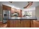 Modern kitchen featuring granite countertops, stainless steel appliances and hardwood floors with recessed ceiling lighting at 44 Supreme Dr, Lillington, NC 27546