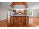 Charming kitchen island with dark countertops, stainless appliances, and hardwood floors with ceiling design with recessed lighting at 44 Supreme Dr, Lillington, NC 27546