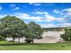 Backyard with trees and a lake view including a dock in the back of the property at 503 Bellmeade Bay Dr, Durham, NC 27703