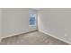 Neutral bedroom with carpet, a window offering natural light, and electrical outlets at 503 Bellmeade Bay Dr, Durham, NC 27703