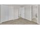 Bedroom with carpet and double closets with access to a hallway and an ensuite bathroom at 503 Bellmeade Bay Dr, Durham, NC 27703
